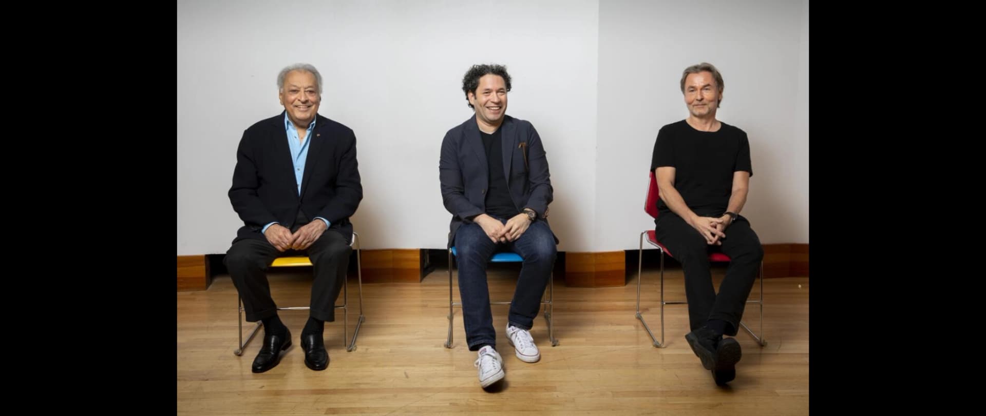 Zubin Mehta, Gustavo Dudamel, and Esa-Pekka Salonen sit after being interviewed.