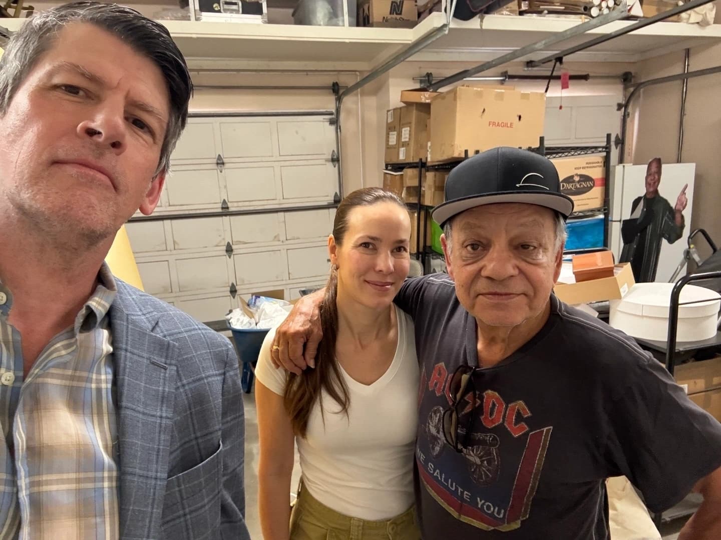 John Rabe, Natasha and Cheech in their garage