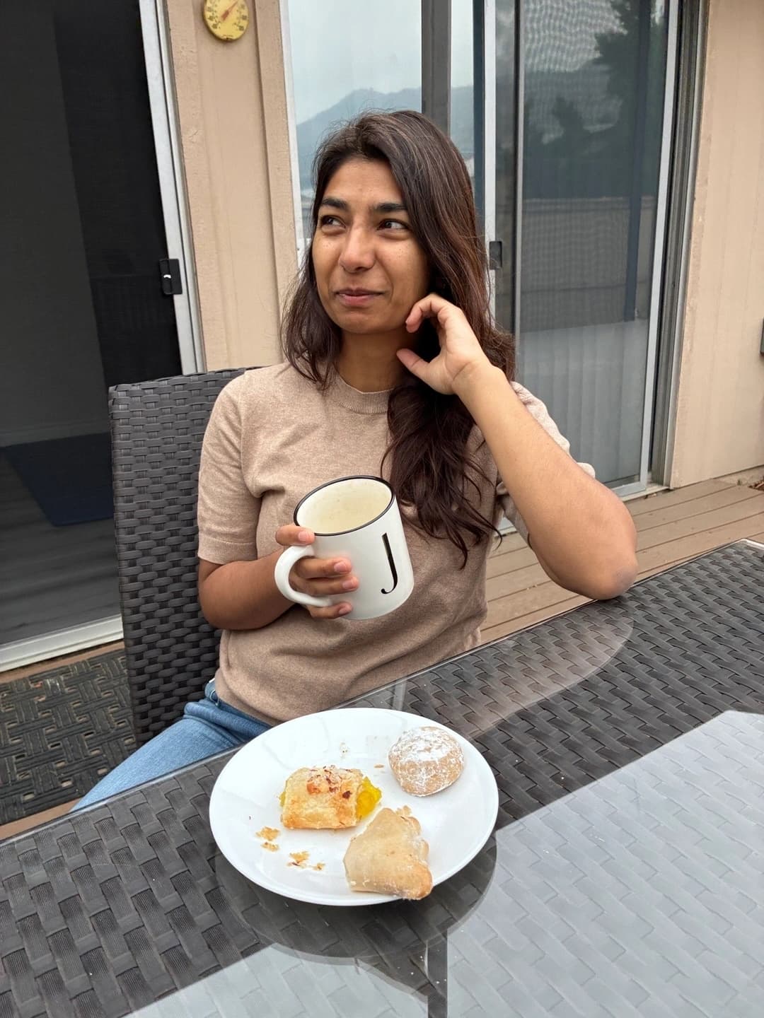 Juhi Bonsal enjoying coffee and pastries from Alondra’s Bakery in her new neighborhood in Azsusa.